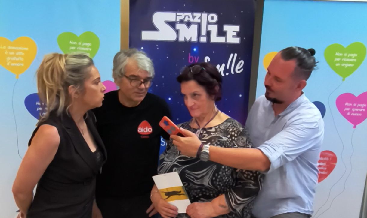 al centro SUSY CAPPELLARI e MAURIZIO PASSAFINI AIDO CANTU'